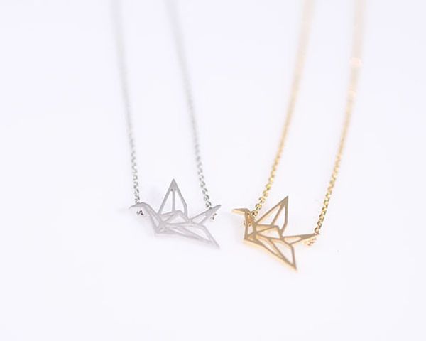 Classic hollow pendant necklace featuring a simple outline of a flying bird, an elegant jewelry accessory perfect as a gift for women