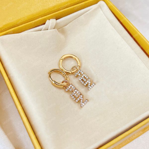 Classic pearl stud earrings with heart and gold hoop designs for stylish women and men