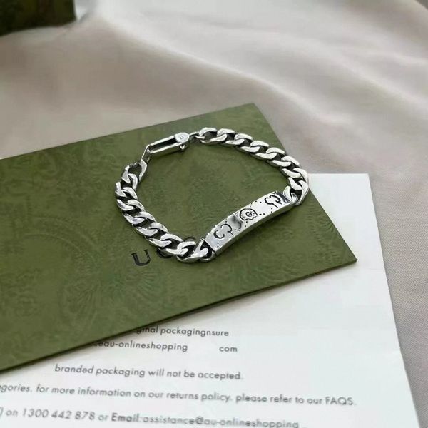 Classic silver bangle bracelet with skull design, stylish titanium steel cuff for men and women, perfect jewelry gift C80009