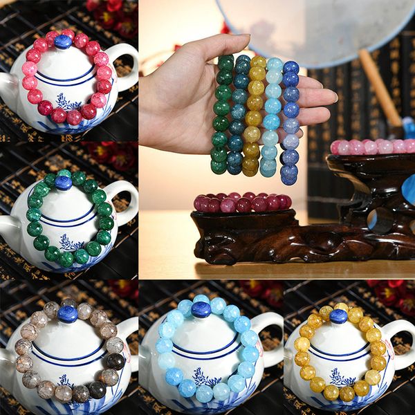 Cracked Stone Charm Colorful Handmade Glass Bead Bracelet Women Popcorn Glass 10mm Beaded Bracelet

Vibrant handmade glass bead bracelet for women featuring cracked stone charms and 10mm popcorn beads