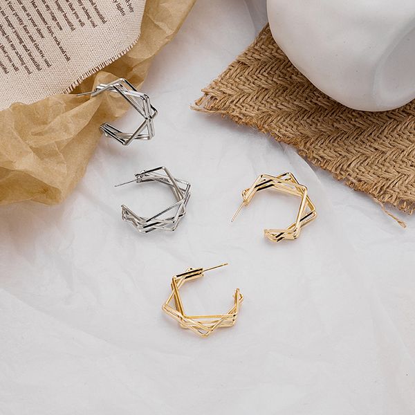 Creative multi-layered geometric metal earrings with a bold wind-inspired design, trendy and personalized for women