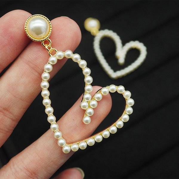 Cuff Stud Earrings featuring a pearl design, crafted in 925 silver for women