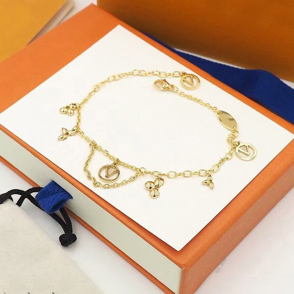 dainty floral bracelet charms with gold-plated letters and crystals, elegant designer jewelry for women and men