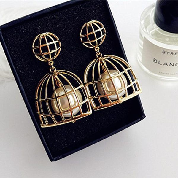 Dangle and chandelier earrings for women featuring gold-tone long designs with large pearl accents, stylish birdcage-inspired jewelry for fashion-forward ladies