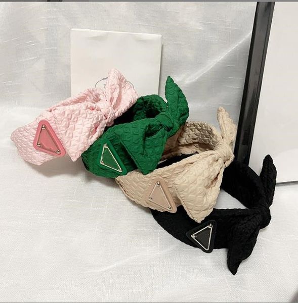 Design Triangle Letters Wide Brim Hair Hoop Candy Color headband Hair Loop Checked cloth Fashion Women Design Headwear High-end Gift

Rewritten:
Stylish wide-brim triangle letter hair hoop with can...