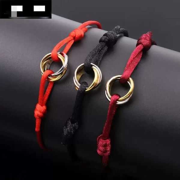 Designer bracelet charm for men and women featuring a stylish trinity of 316L stainless steel rings on a hand strap, perfect for couples