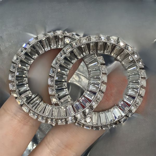 Designer brooch for women and men featuring inlaid crystals and pearls, a stylish fashion accessory and gift option available for wholesale