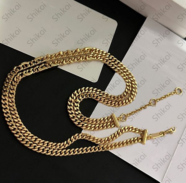 Designer gold jewelry set featuring choker, necklace, bracelet, and earrings for women