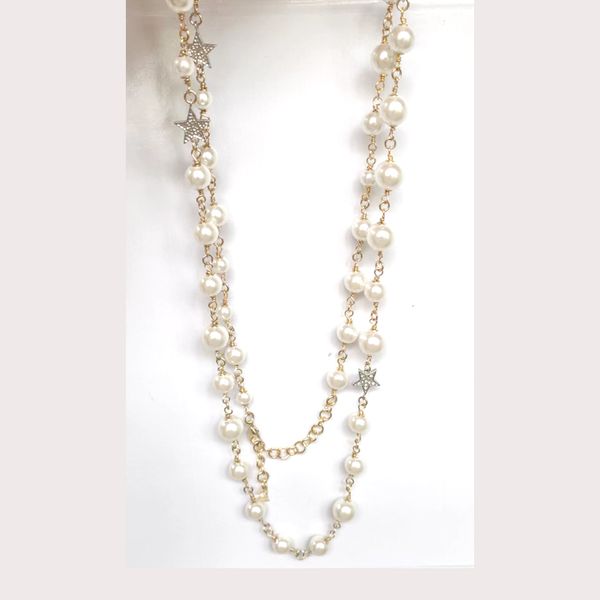 Designer luxury pendant necklaces featuring classic letter styles, elegant pearl strands, and long double-layer sweater chains for a statement look