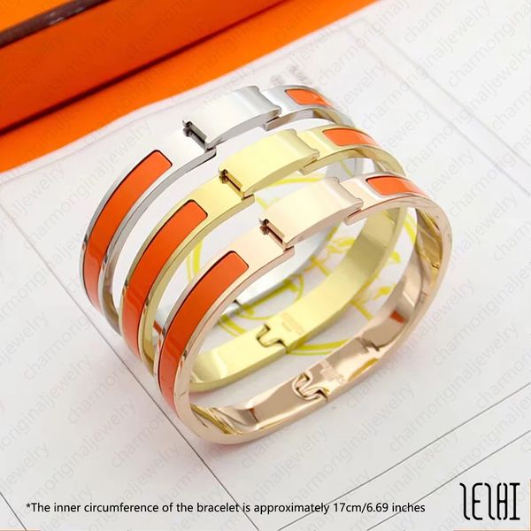 Designer men's hinged cuff bracelet with vintage charms and yellow bangles in luxury gold-tone stainless steel