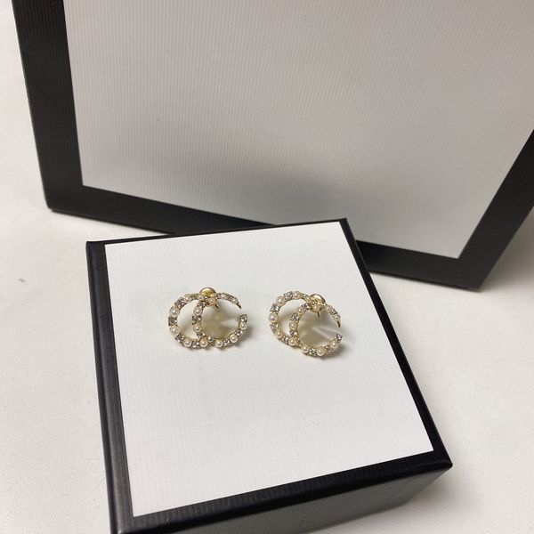 Designer pearl stud earrings for women - fashionable boutique accessories and ideal gifts