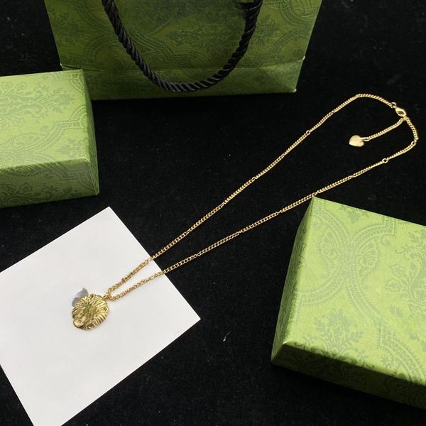 Designer pendant necklace featuring a single diamond, elegant women's jewelry in a high-quality gift box