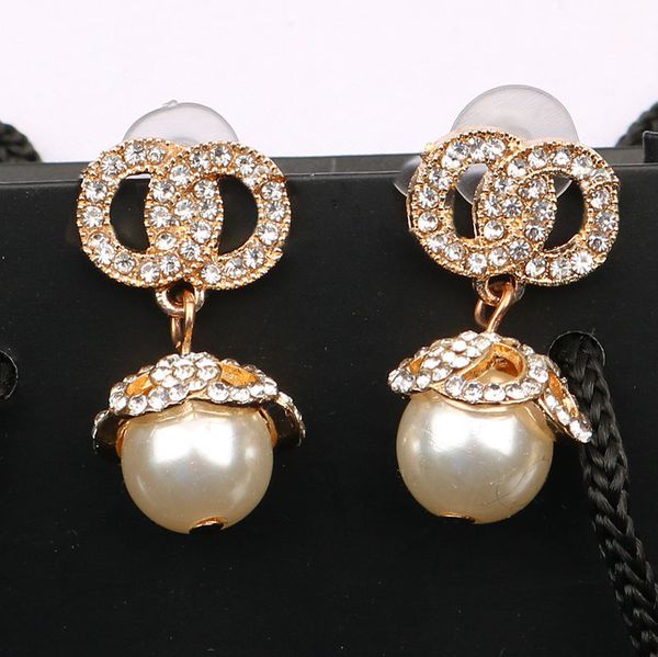 Designer stud earrings in 18K gold-plated 925 silver, featuring elegant crystal pearls for women's fashion, perfect for weddings and parties