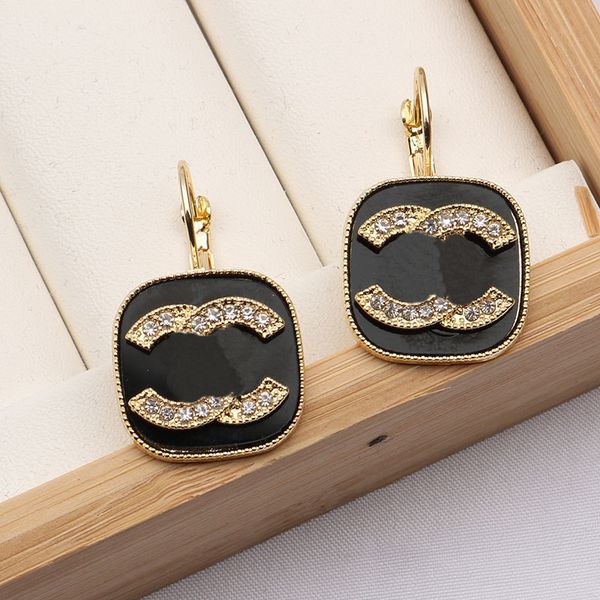 Designer stud earrings in gold and silver, 18K gold-plated with crystals, rhinestones, and pearls for women, available wholesale
