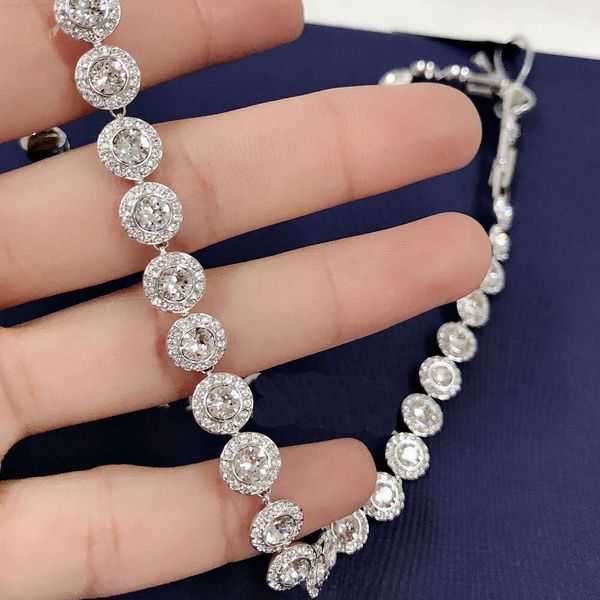 Designer tennis bracelets for women and men featuring evil eye motifs in gold or silver plating with green and blue crystal embellishments
