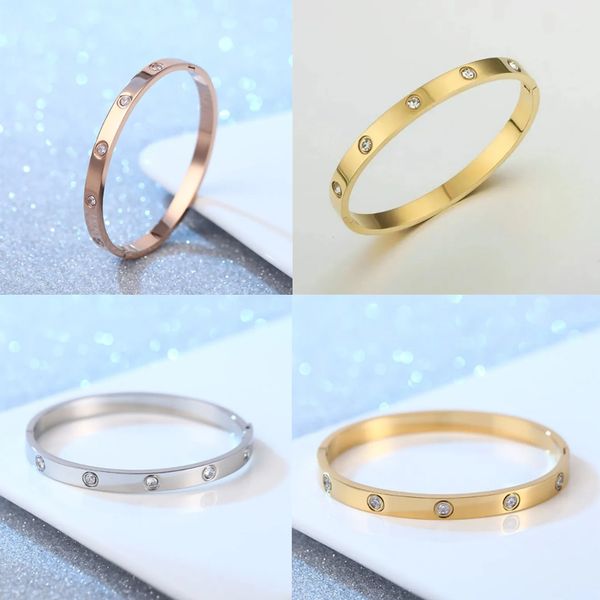 Designer titanium steel bangle with 18K gold plating and fashionable cubic zirconia for women