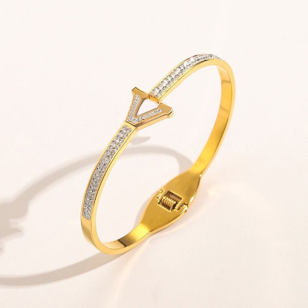 Designer women's bangle bracelet with rhinestones, crystal letters, and 18K gold plating on stainless steel for weddings and lovers