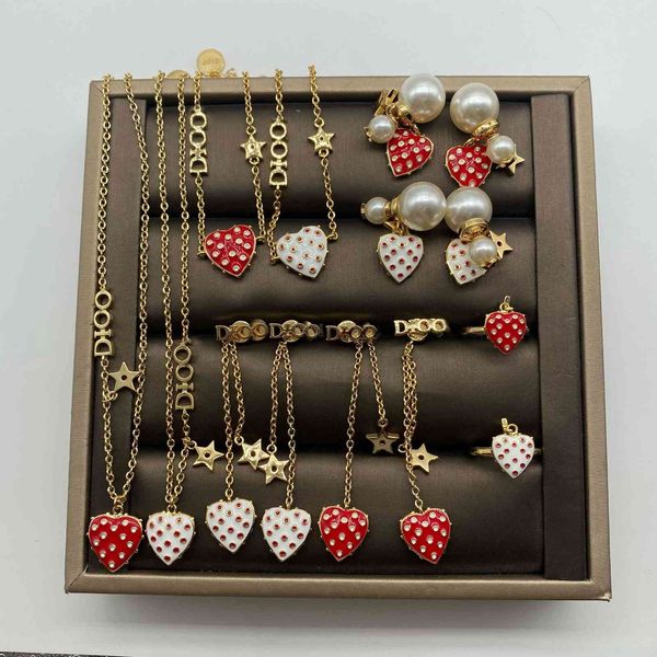 Dijia's 14k Gold Necklace for Women, a Valentine's Day set featuring a strawberry wave bracelet, pearl star earrings, and love-inspired designs