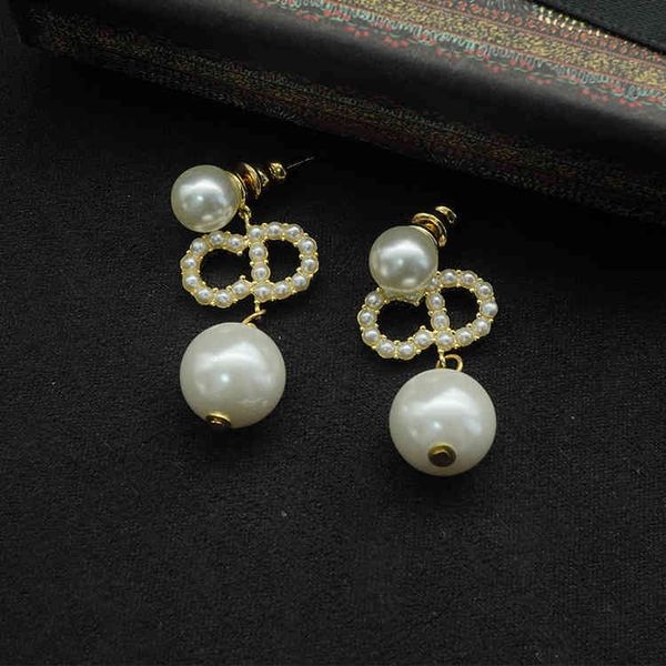 Dio/christian luxury pearl pendant earrings with red accents, fashionable for live broadcasts
