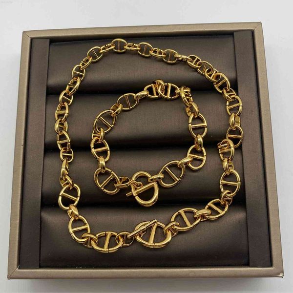 D's latest trendy metal-style blogger-inspired pig nose necklace and bracelet set in brass