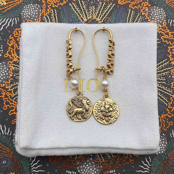 Earrings featuring cuff stud designs in natural styles, fashionable letters, animal motifs, and round shapes from the Dijia brand, recommended for women in red during live broadcasts