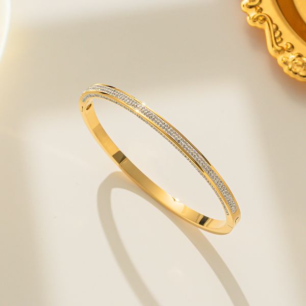 Elegant 18K gold-plated stainless steel bangle bracelet, a perfect women's jewelry gift