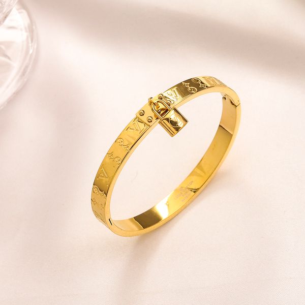 Elegant 18K gold-plated stainless steel bangle bracelets with steel seal, blending European and American fashion styles for women, perfect as luxury designer jewelry or wedding lovers' gifts