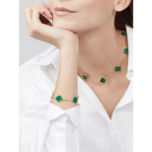Elegant 18K gold-plated stainless steel jewelry set featuring a double-sided clover pendant for necklace and bracelet, perfect as a gift