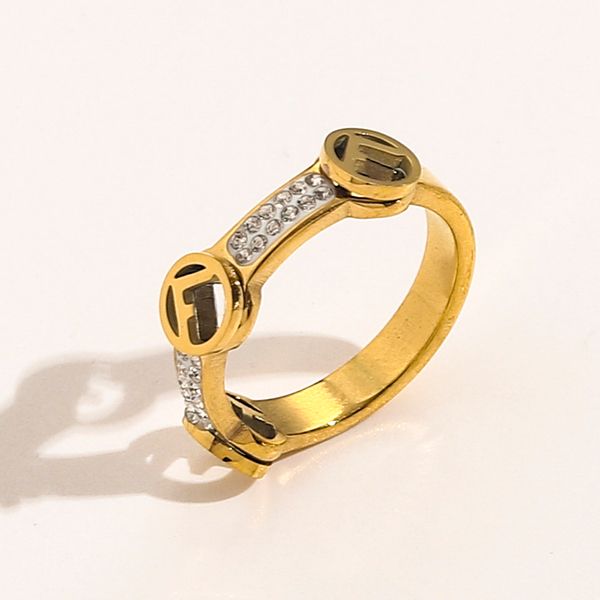 Elegant 18K gold-plated stainless steel rings for women, featuring diamond accents and stylish letter designs, perfect for love, weddings, or fashion