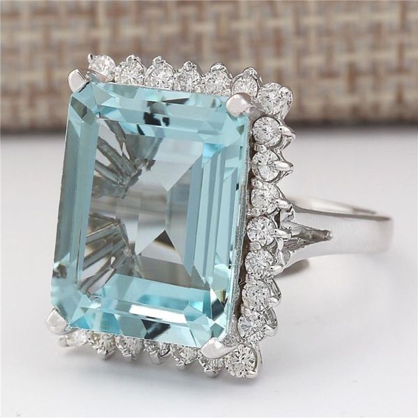 Elegant 925 sterling silver ring featuring natural aquamarine gemstones in a square invisible setting, perfect for women's fine jewelry