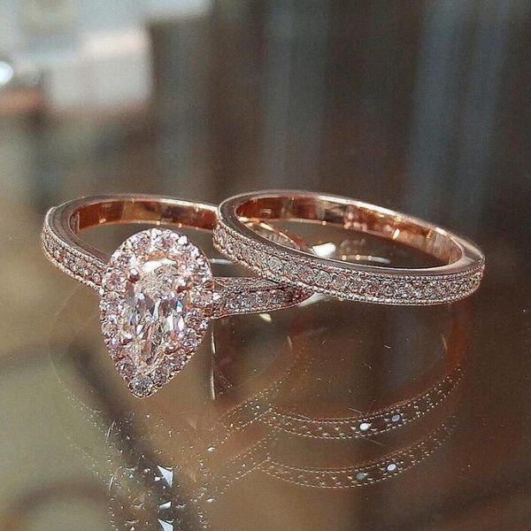 Elegant 925 sterling silver rose gold-filled bridal ring featuring pear-cut white topaz and CZ diamonds