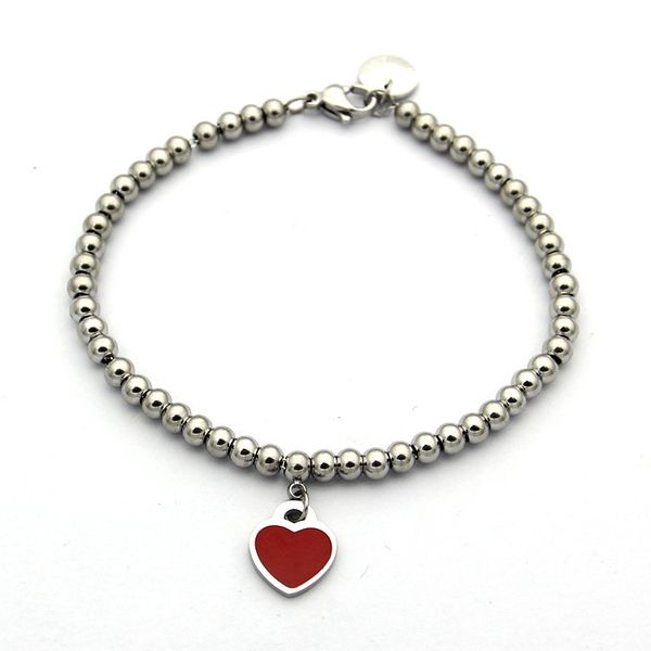 Elegant beaded bracelet for women featuring heart-shaped charms in green, blue, and pink with 4mm beads