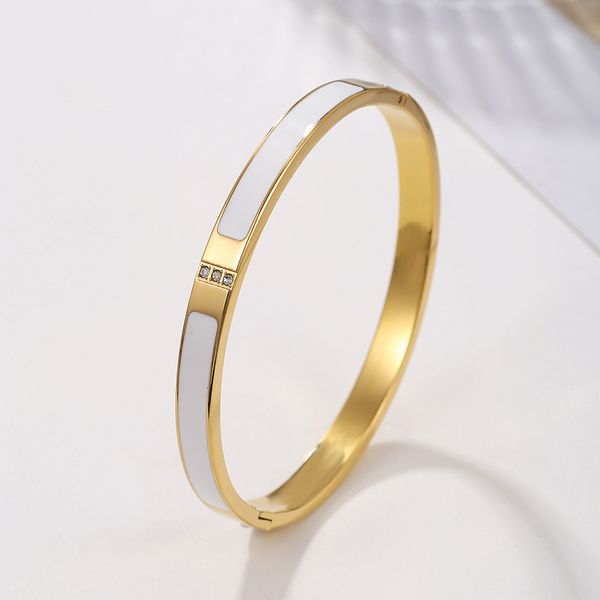 Elegant black and white enamel bangle bracelet in luxurious titanium steel, a stylish jewelry gift for women