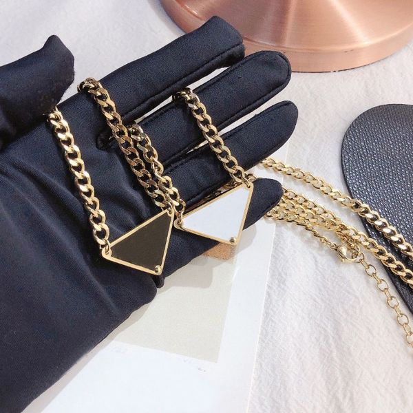 Elegant black and white triangle pendant necklace for women, a stylish spring accessory perfect as a love or birthday gift, crafted from stainless steel