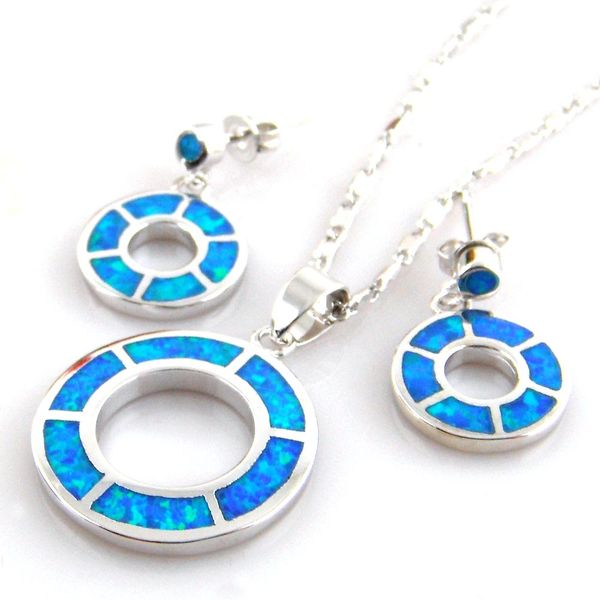 Elegant blue opal jewelry set featuring a pendant and matching hoop earrings for women