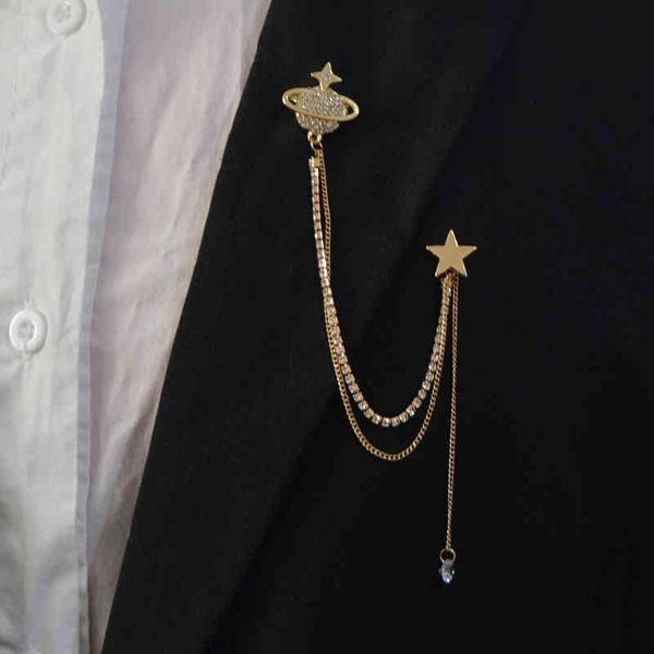 Elegant brooch featuring golden planet chain tassels, high-end diamond accents, and stylish feminine design for fashionable accessory sets