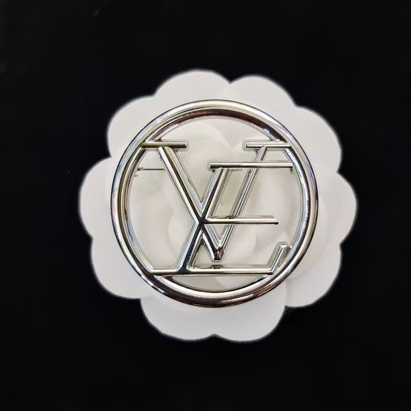 Elegant designer brooch with rhinestones, perfect for luxury fashion and festive occasions like Christmas parties