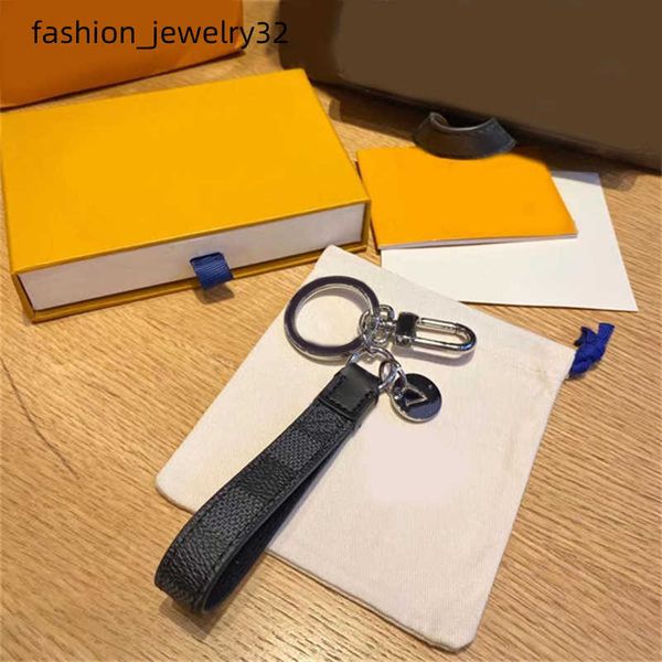 Elegant designer keychain for men with alloy metal parts, cowhide leather, and cute canvas in black and pink