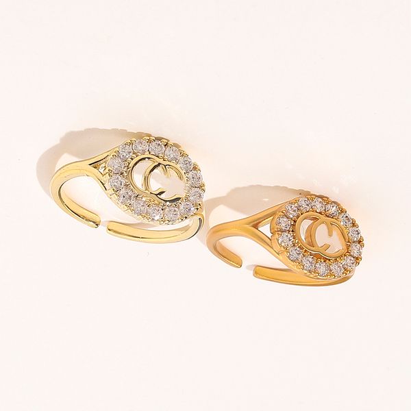 Elegant designer rings for women featuring charms, ideal for weddings, crafted with crystal and 18K gold-plated copper, adjustable for a perfect fit, a luxurious accessory choice