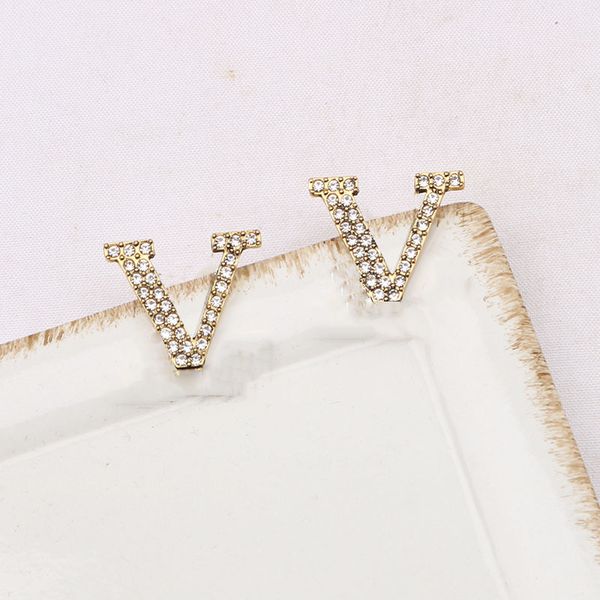 Elegant designer stud earrings for women, chic letter jewelry in gold or silver with 18k diamonds, perfect Valentine's or wedding gifts, available wholesale in various styles