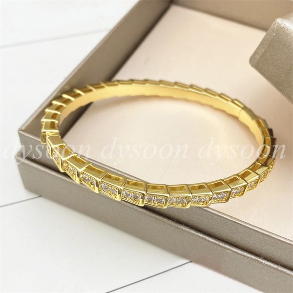 Elegant diamond-studded bangles for women, presented in a stylish box