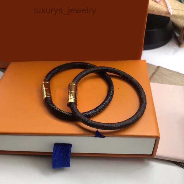 Elegant fashion designer women's bracelet with delicate charm, invisible luxury jewelry featuring a new magnetic clasp on a gold leather wristband