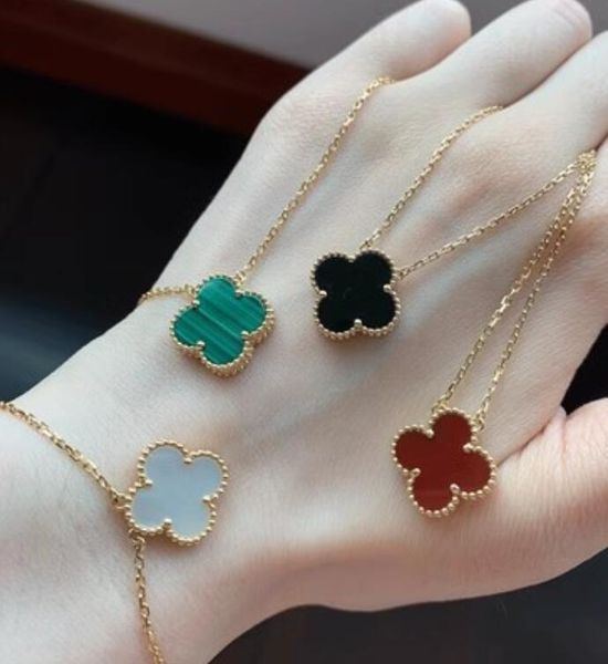 Elegant four-leaf clover pendant necklace for women, a stylish gold-plated choker jewelry piece