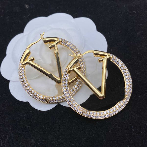 Elegant gold hoop earrings for women, perfect for parties, weddings, and as romantic couple gifts or bridal jewelry