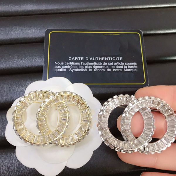 Elegant gold-plated copper brooches with crystal and pearl accents for women, perfect for suits, weddings, and parties
