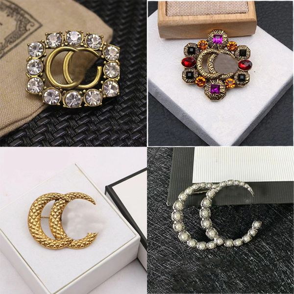 Elegant gold-plated designer brooches featuring brand initials, perfect as stylish women's jewelry or a charming wedding gift accessory