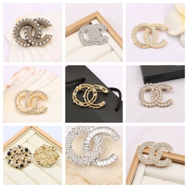 Elegant gold-plated women's fashion brooches with rhinestones, pearls, and letter designs, perfect as party gifts
