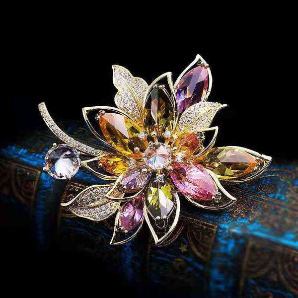 Elegant gold-tone zircon flower brooch for women, inspired by Korean fashion trends