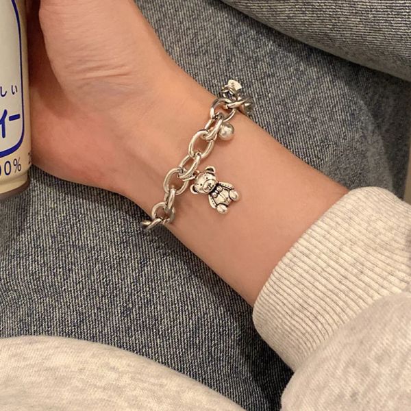 Elegant handmade vintage bear pendant charm bracelet in 14K white gold, perfect for women's weddings and luxury jewelry