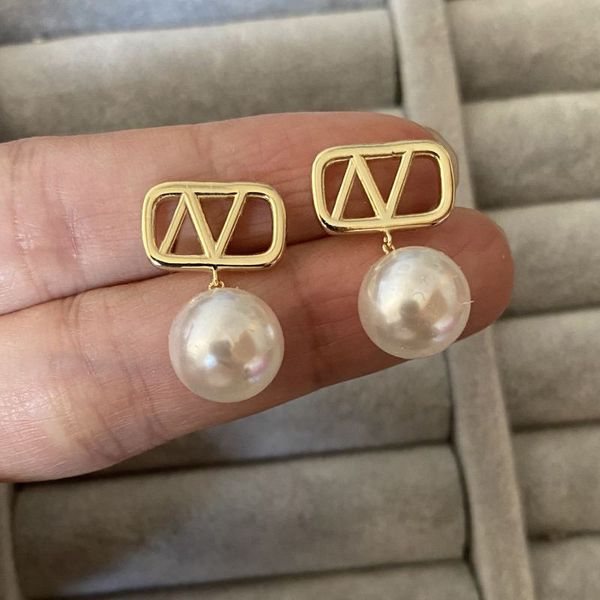 Elegant high-polish stainless steel designer earrings for women, perfect as luxury fashion gifts or engagement jewelry